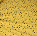 Tissu popeline coton jaune aux fleurs graphiques jaunes - TissusPapi.com