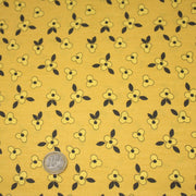 Tissu popeline coton jaune aux fleurs graphiques jaunes - TissusPapi.com