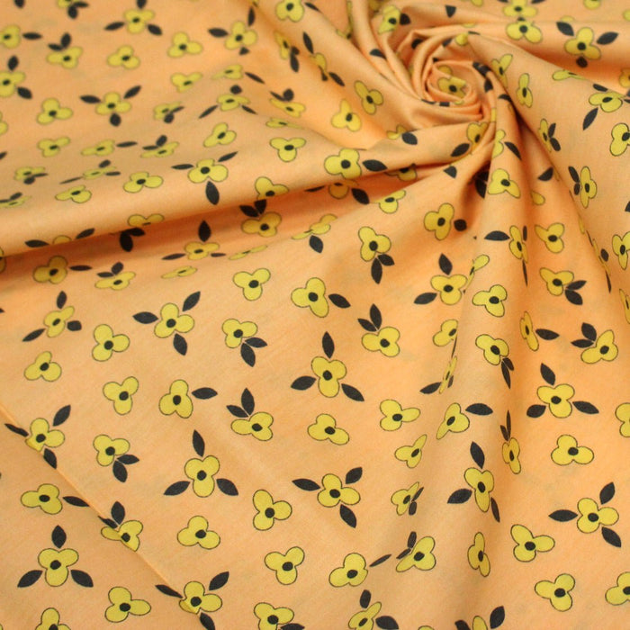 Tissu popeline coton corail aux fleurs graphiques jaunes - TissusPapi.com