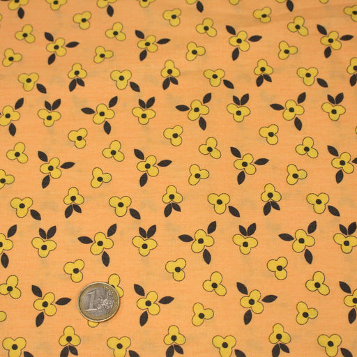 Tissu popeline coton corail aux fleurs graphiques jaunes - TissusPapi.com