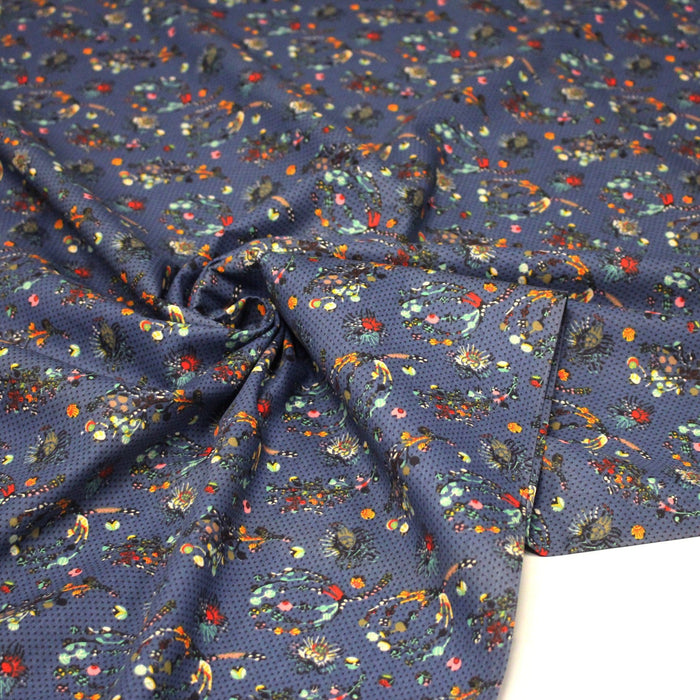 Tissu popeline coton bleu aux fins pois noirs et fines fleurs multicolores - TissusPapi.com