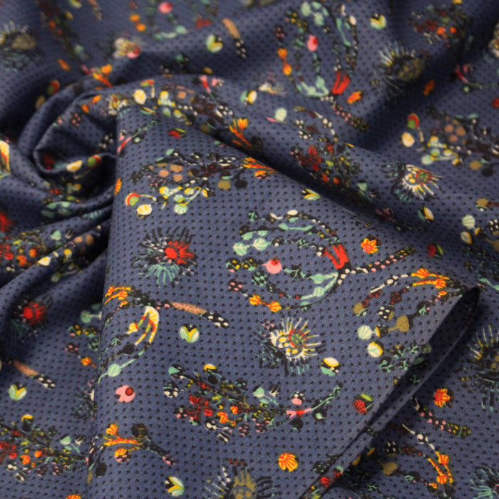 Tissu popeline coton bleu aux fins pois noirs et fines fleurs multicolores - TissusPapi.com