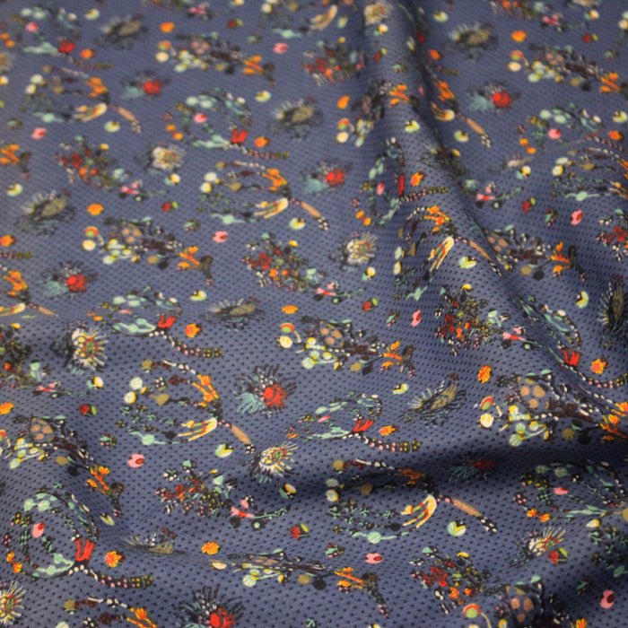 Tissu popeline coton bleu aux fins pois noirs et fines fleurs multicolores - TissusPapi.com