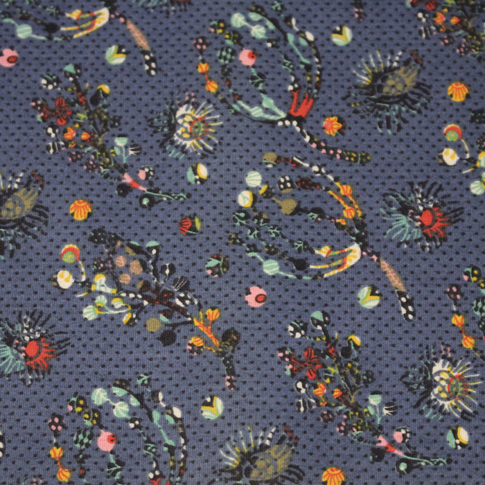 Tissu popeline coton bleu aux fins pois noirs et fines fleurs multicolores - TissusPapi.com