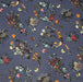 Tissu popeline coton bleu aux fins pois noirs et fines fleurs multicolores - TissusPapi.com