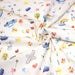 Tissu cotonnade aux DESSINS D'ENFANT multicolores, fond blanc - TissusPapi.com