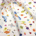 Tissu cotonnade aux DESSINS D'ENFANT multicolores, fond blanc - TissusPapi.com