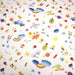 Tissu cotonnade aux DESSINS D'ENFANT multicolores, fond blanc - TissusPapi.com