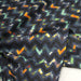 Tissu popeline coton zig zag bleu, noir et fines fleurs multicolores - TissusPapi.com