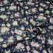 Tissu popeline coton bleu aux marguerites blanches et jaunes - TissusPapi.com