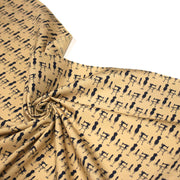 Tissu popeline coton LA COUTURE, mannequins & machines à coudre, fond ocre - TissusPapi.com