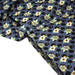 Tissu popeline coton bleu aux coeurs noirs et petits fleurs multicolores - TissusPapi.com