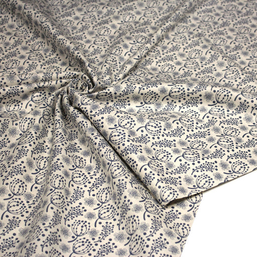 Tissu popeline coton écru aux fines fleurs bleues - TissusPapi.com