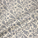 Tissu popeline coton écru aux fines fleurs bleues - TissusPapi.com