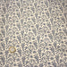 Tissu popeline coton écru aux fines fleurs bleues - TissusPapi.com