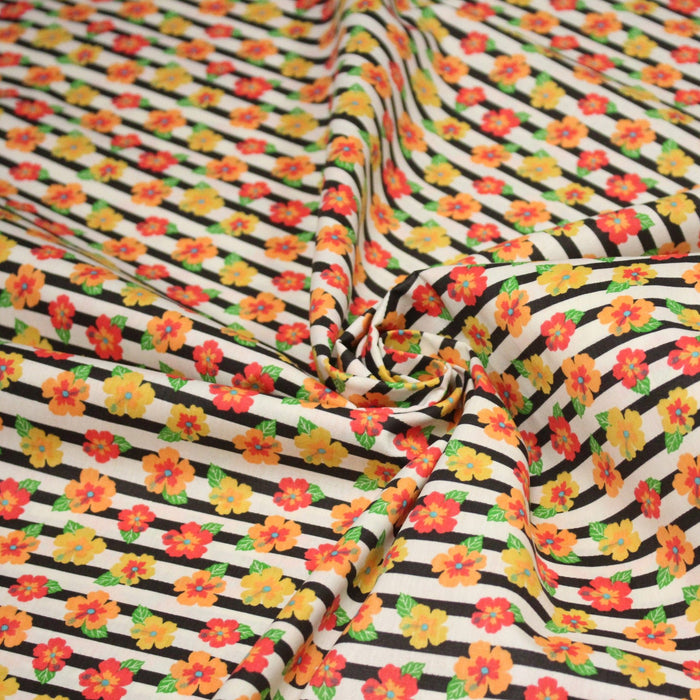 Tissu popeline coton, rayures écrues et noires aux fleurs d'hibiscus multicolores - TissusPapi.com