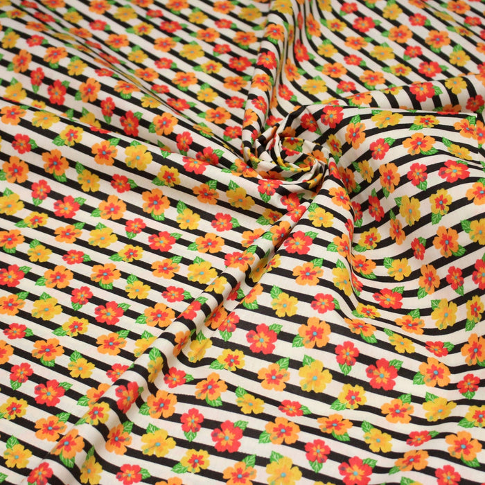 Tissu popeline coton, rayures écrues et noires aux fleurs d'hibiscus multicolores - TissusPapi.com