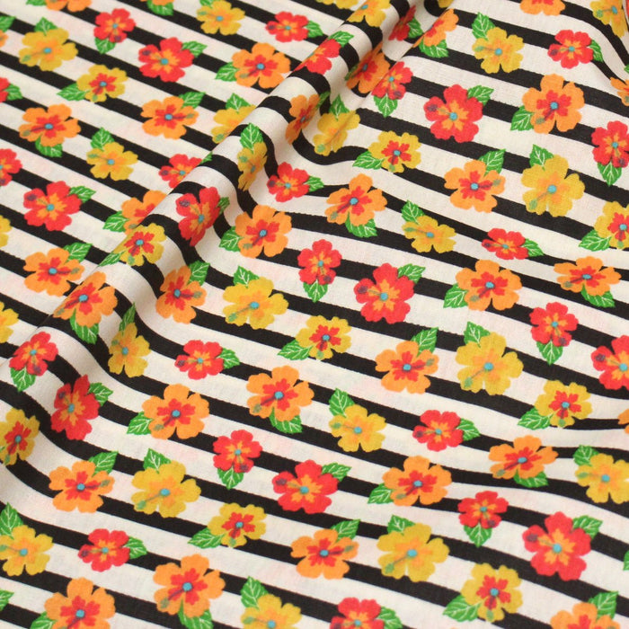 Tissu popeline coton, rayures écrues et noires aux fleurs d'hibiscus multicolores - TissusPapi.com