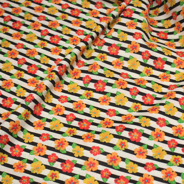Tissu popeline coton, rayures écrues et noires aux fleurs d'hibiscus multicolores - TissusPapi.com