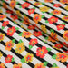 Tissu popeline coton, rayures écrues et noires aux fleurs d'hibiscus multicolores - TissusPapi.com
