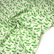 Tissu popeline coton écru aux fougères et feuilles tropicales vertes - TissusPapi.com