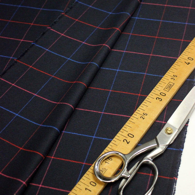 Tissu draperie lainage bleu nuit motif windowpane aux liserés roses rouges et bleu roi - TissusPapi.com