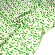Tissu popeline coton écru aux fougères et feuilles tropicales vertes - TissusPapi.com