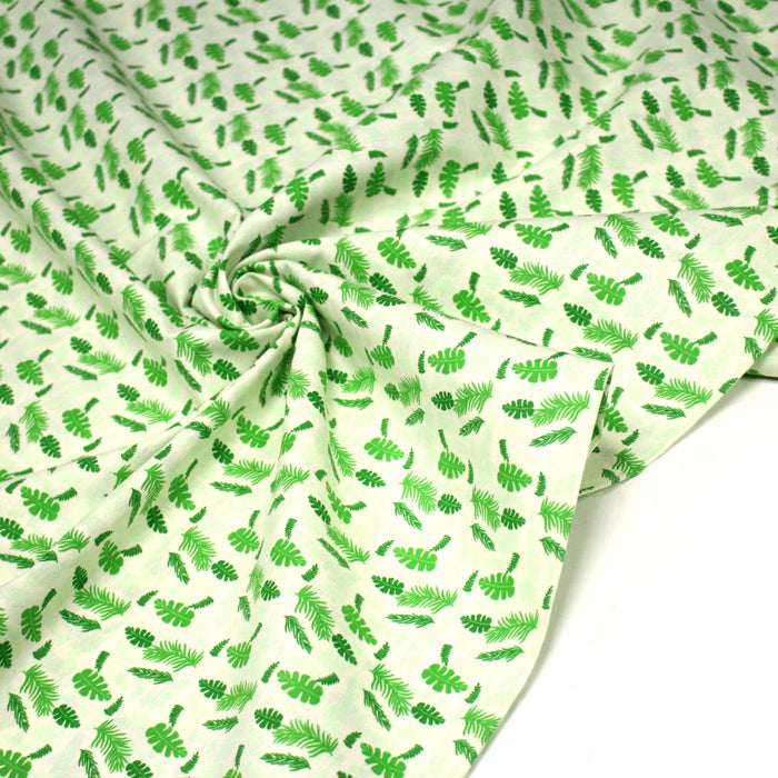 Tissu popeline coton écru aux fougères et feuilles tropicales vertes - TissusPapi.com