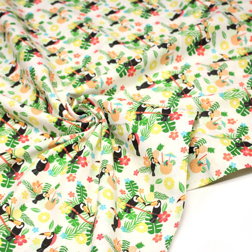 Tissu popeline coton écru aux toucans et plantes tropicales multicolores - TissusPapi.com