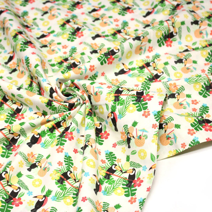Tissu popeline coton écru aux toucans et plantes tropicales multicolores - TissusPapi.com