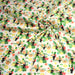 Tissu popeline coton écru aux toucans et plantes tropicales multicolores - TissusPapi.com