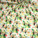 Tissu popeline coton écru aux toucans et plantes tropicales multicolores - TissusPapi.com