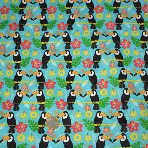 Tissu popeline coton turquoise aux toucans et plantes tropicales multicolores - TissusPapi.com