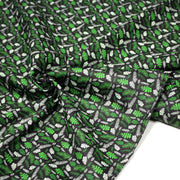 Tissu popeline coton noir aux fougères et feuilles tropicales vertes - TissusPapi.com