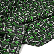 Tissu popeline coton noir aux fougères et feuilles tropicales vertes - TissusPapi.com
