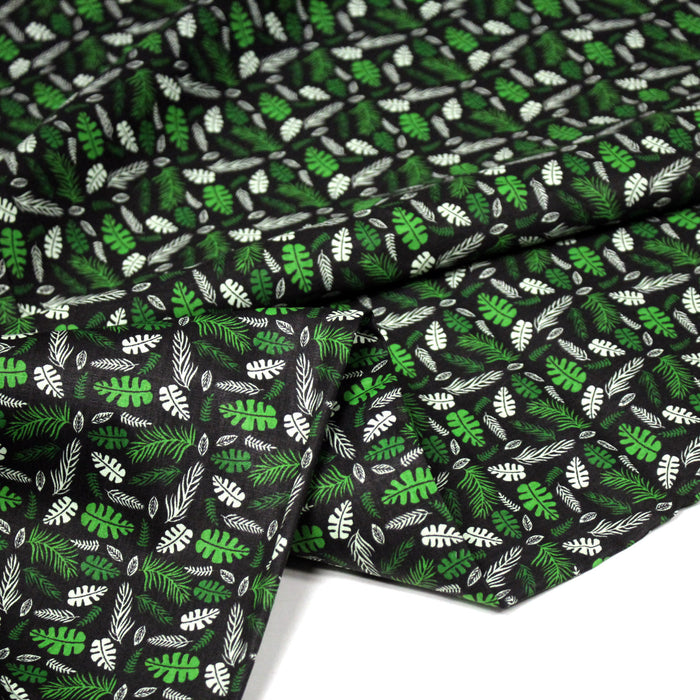 Tissu popeline coton noir aux fougères et feuilles tropicales vertes - TissusPapi.com