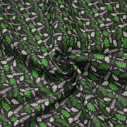 Tissu popeline coton noir aux fougères et feuilles tropicales vertes - TissusPapi.com