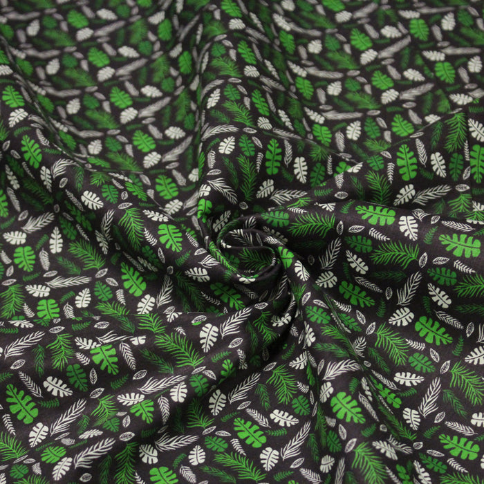 Tissu popeline coton noir aux fougères et feuilles tropicales vertes - TissusPapi.com