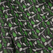 Tissu popeline coton noir aux fougères et feuilles tropicales vertes - TissusPapi.com