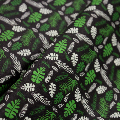 Tissu popeline coton noir aux fougères et feuilles tropicales vertes - TissusPapi.com