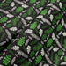 Tissu popeline coton noir aux fougères et feuilles tropicales vertes - TissusPapi.com