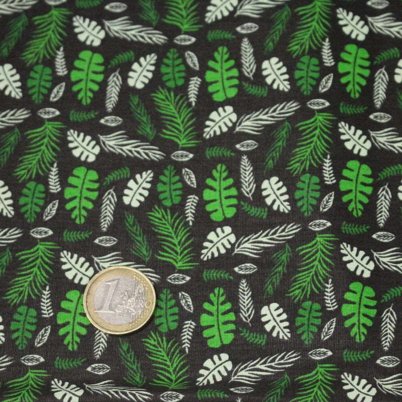 Tissu popeline coton noir aux fougères et feuilles tropicales vertes - TissusPapi.com
