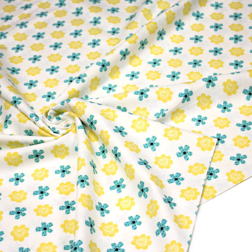 Tissu popeline coton blanc aux fleurs graphiques jaunes et bleues - TissusPapi.com