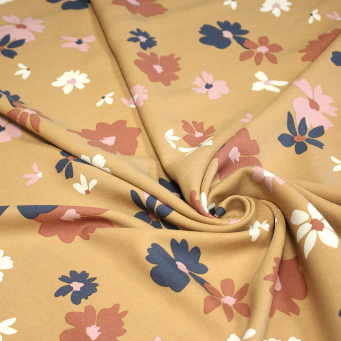 Tissu Viscose fluide AIDINA, ocre aux fleurs noirs, roses et blanches - OEKO-TEX