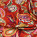 Tissu Viscose fluide ANJALI motif cachemire multicolore fond rouge – STANDARD 100 OEKO - TEX - TissusPapi.com