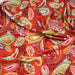 Tissu Viscose fluide ANJALI motif cachemire multicolore fond rouge – STANDARD 100 OEKO - TEX - TissusPapi.com