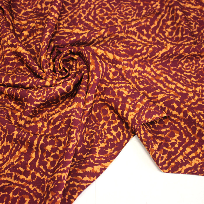Tissu Viscose fluide ASSA arabesques rouge bordeaux fond ocre – STANDARD 100 OEKO-TEX
