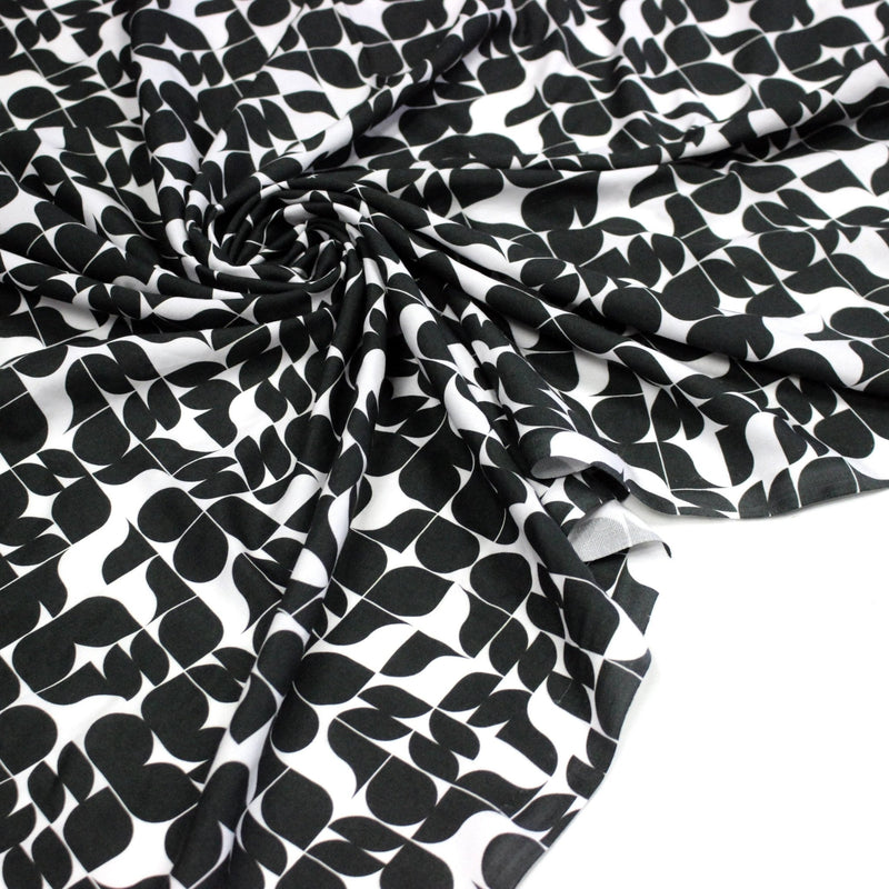 Tissu viscose fluide SEVENTIES, motif géométrique noir et blanc - STANDARD 100 OEKO - TEX - TissusPapi.com