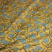 Tissu coton fin imprimé INDIENNES, fleurs traditionnelles bleues, feuilles vertes, fond jaune moutarde - TissusPapi.com