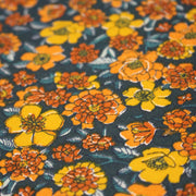 Tissu cotonnade motif fleuri bleu canard & jaune orange - OEKO - TEX STANDARD 100 - TissusPapi.com